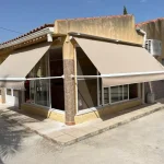 Toldos Curvos de Doble Caída